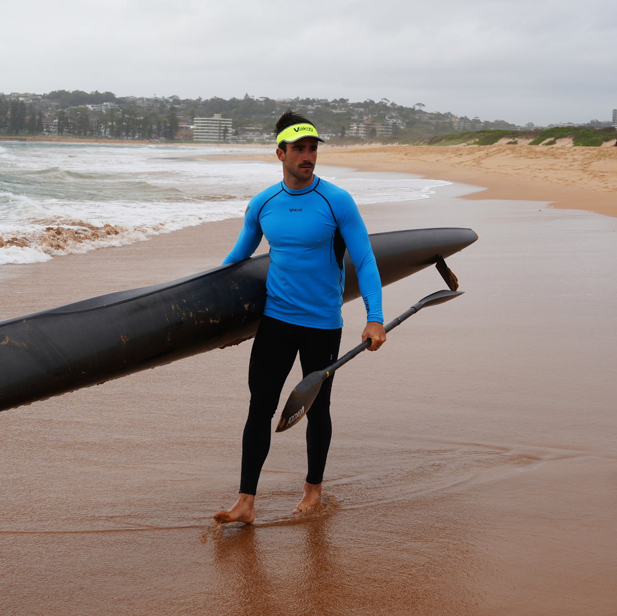 Vaikobi Hydroflex Top cyan paddler on surfski