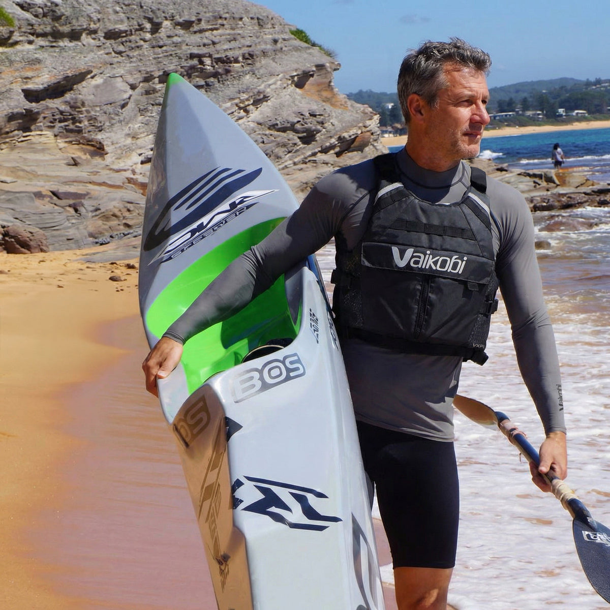 Vaikobi VXP II Race PFD Black Edition - paddler with surfski