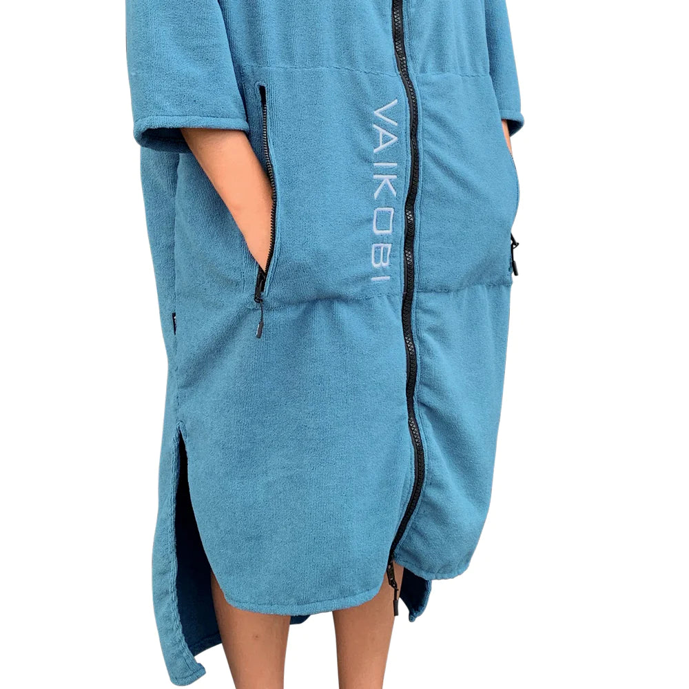Vaikobi Hooded Change Towel ocean with female model  - detail pockets