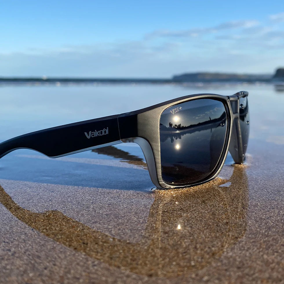 Vaikobi Molokai Sunglasses - immersed in water at beach