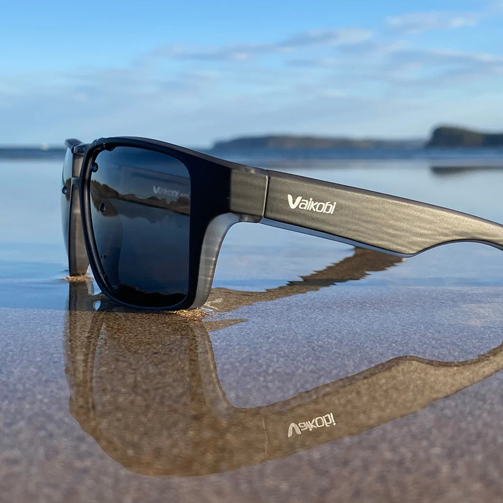 Vaikobi Molokai Sunglasses - immersed in water at beach