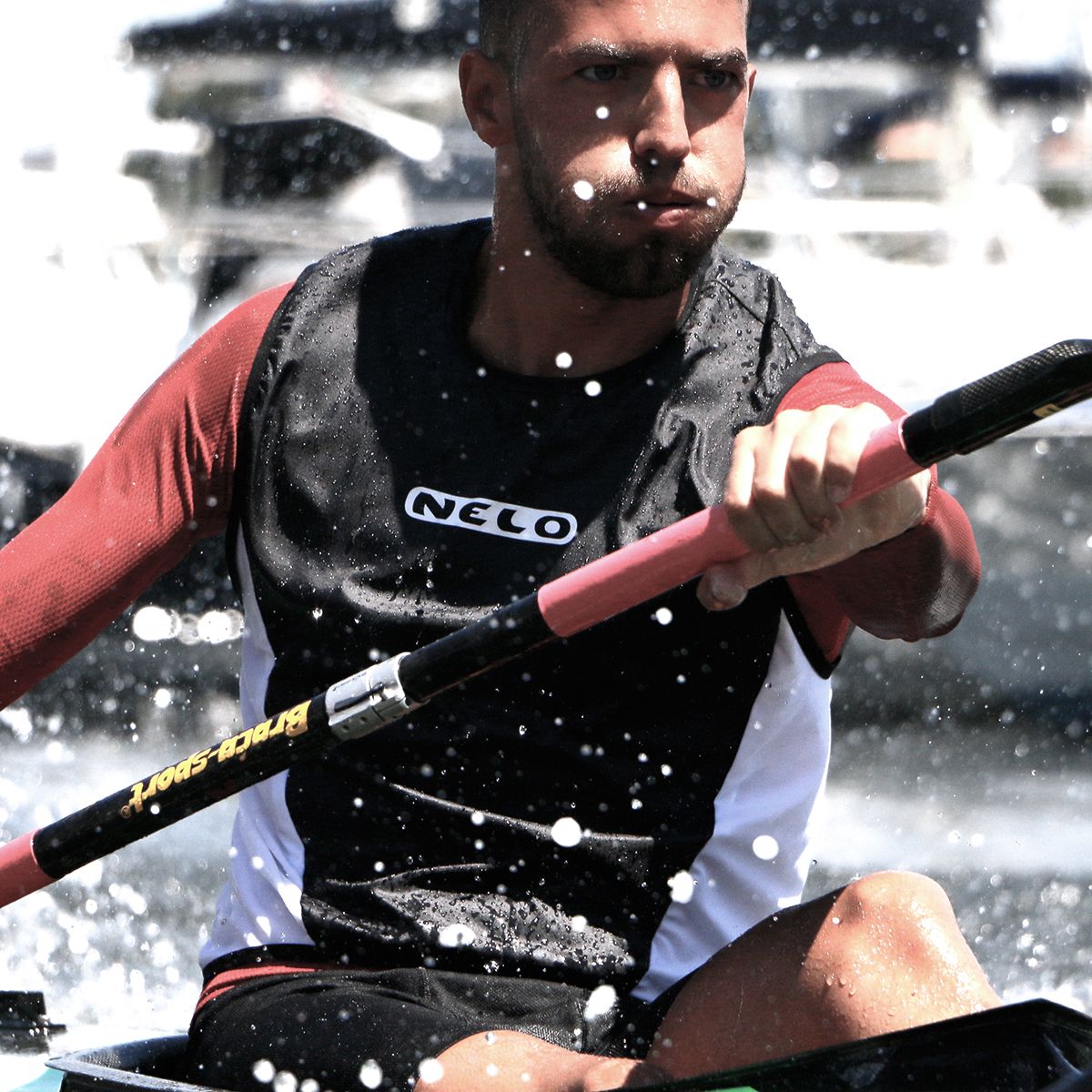Nelo kayak wind vest athlete paddling